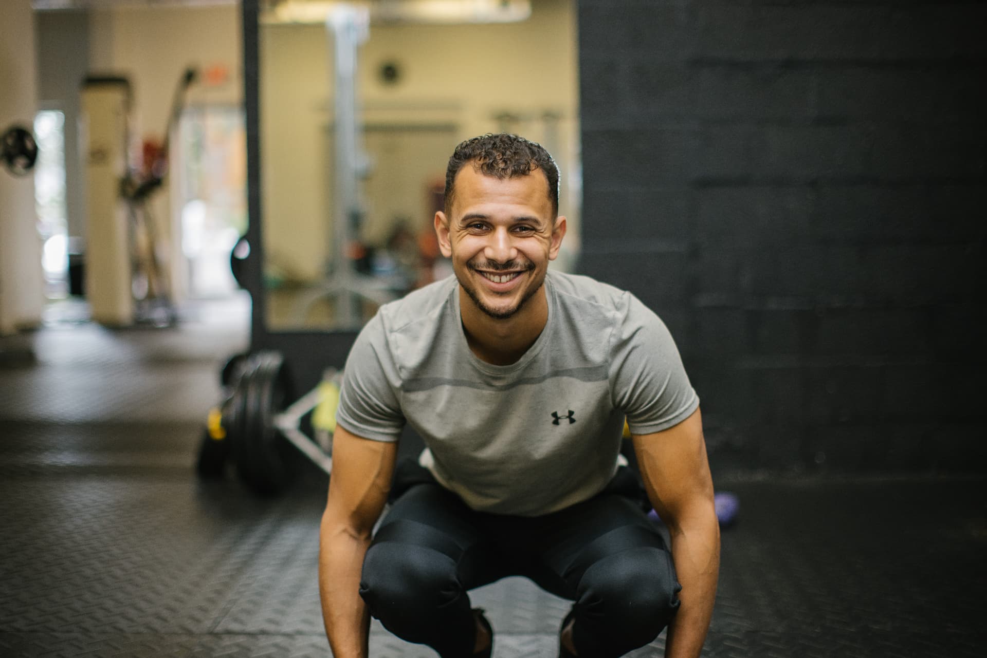 Breno smiling on the gym floor
